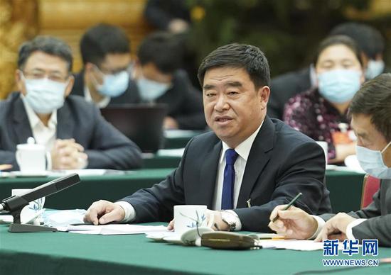 5月22日，全國人大代表薛志國參加內蒙古代表團的審議并發(fā)言。新華社記者 黃敬文 攝
