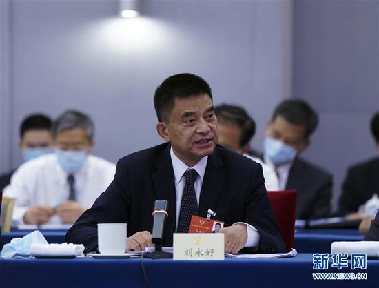  5月23日，全國政協(xié)委員劉永好在政協(xié)聯(lián)組會(huì )上發(fā)言。新華社記者 謝環(huán)馳 攝